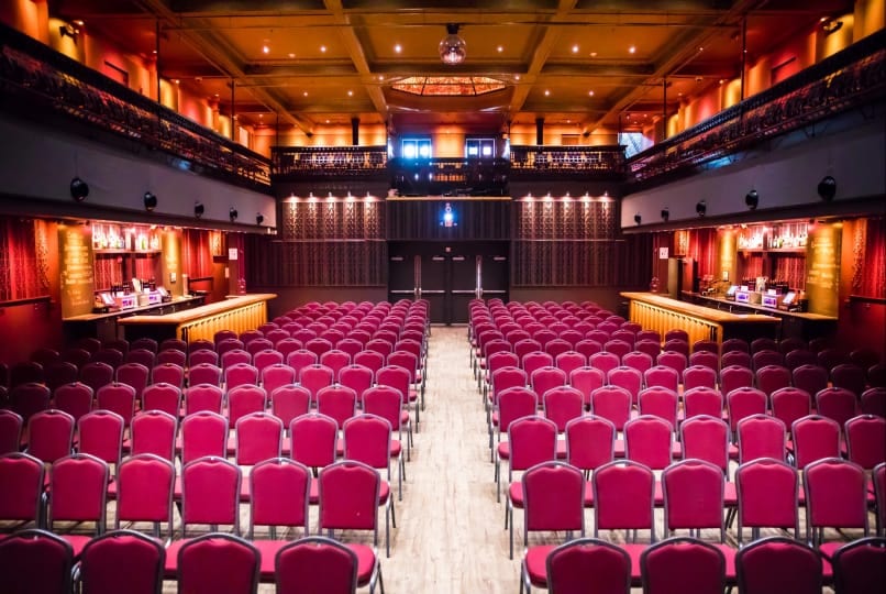Theater seating and stage set up for a corporate event at White Eagle Hall venue rental