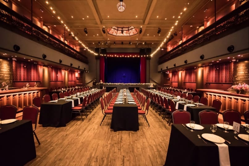 Banquet tables set for a private event at White Eagle Hall venue rental